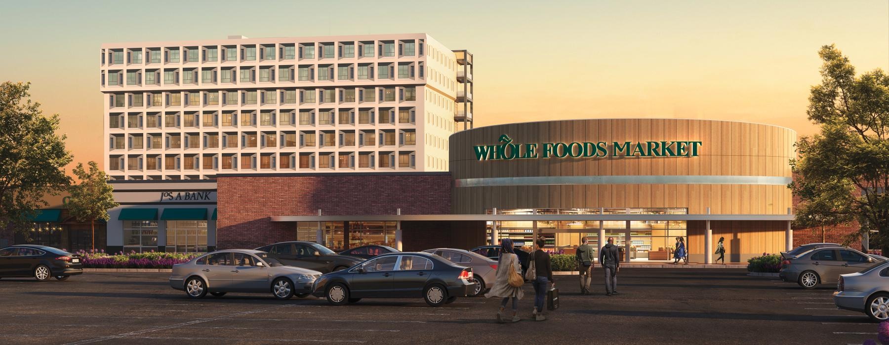 a parking lot with cars and people