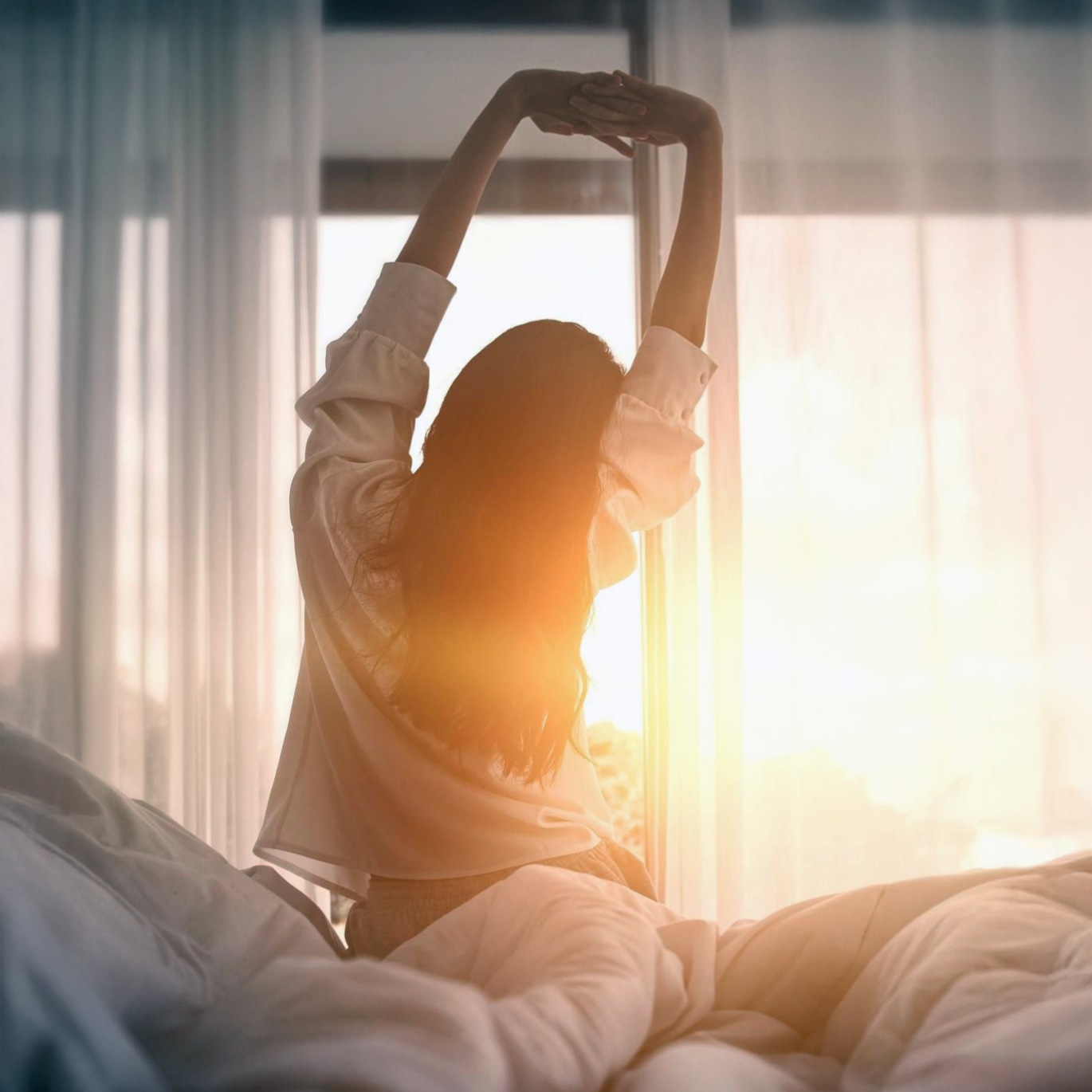 a woman stretching in the morning