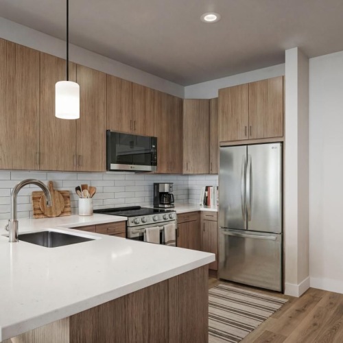 a kitchen with wooden cabinets